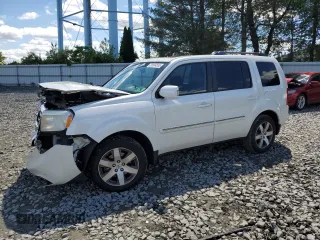 2014 Honda Pilot Touring z VIN 5FNYF4H97EB032562, wystawiony jako Copart lot #56004555 z przebiegiem 120 493 mil mil oraz Szkody całkowita. Historia ofert i sprzedaży dostępna na DreamBid. Obrazek 1.