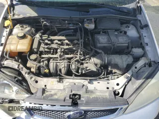 2007 Ford Focus S with VIN 1FAFP34N87W171671, listed as a Copart auction lot 49335385 with 140,638 mi miles and Salvage Title. Bid and sale history available at carsss.com. Image 11.