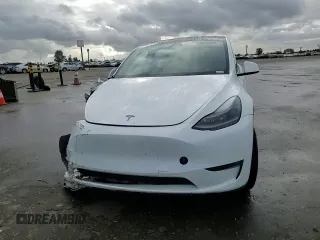 2023 Tesla Model Y Long Range z VIN 7SAYGAEE5PF743079, wystawiony jako Copart lot #45570655 z przebiegiem 46 145 mil mil oraz Szkoda całkowita • Salvage title. Historia ofert i sprzedaży dostępna na DreamBid. Obrazek 11.