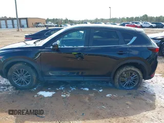 2020 Mazda CX-5 Touring z VIN JM3KFBCMXL1741182, wystawiony jako IAAI lot #41602315 z przebiegiem 31 582 mil mil oraz . Historia ofert i sprzedaży dostępna na DreamBid. Obrazek 15.