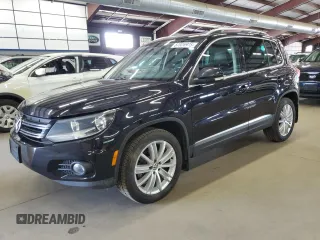 2014 Volkswagen Tiguan SEL with VIN WVGBV3AX1EW610870, listed as a Copart auction lot 67026975 with 148,321 mi miles and Clean title. Bid and sale history available at DreamBid. Image 1.