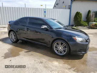 2012 Scion tC z VIN JTKJF5C76C3034769, wystawiony jako Copart lot #52517495 z przebiegiem 205 501 mil mil oraz Nie do naprawy. Historia ofert i sprzedaży dostępna na DreamBid. Obrazek 4.
