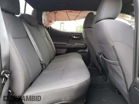 2019 Toyota Tacoma SR z VIN 3TMCZ5AN6KM283109, wystawiony jako Copart lot #58668905 z przebiegiem 44 923 mil mil oraz Szkoda całkowita • Salvage title. Historia ofert i sprzedaży dostępna na DreamBid. Obrazek 10.