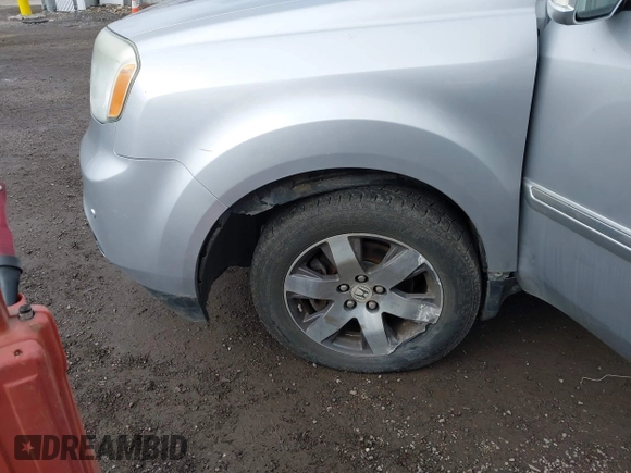 2015 Honda Pilot Touring with VIN 5FNYF4H94FB018152, listed as a IAAI auction lot 41812170 with 130,661 mi miles. Bid and sale history available at carsss.com. Image 6.