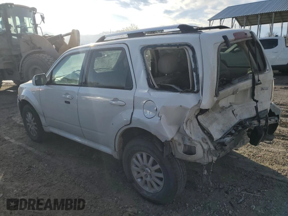 2011 Mercury Mariner Premier with VIN 4M2CN9HG4BKJ07803, listed as a Copart auction lot 46491925 with 135,951 mi miles and Salvage title. Bid and sale history available at DreamBid. Image 2.