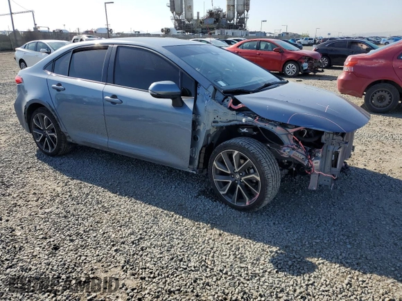 2022 Toyota Corolla SE with VIN JTDS4MCEXN3503519, listed as a Copart auction lot 51928405 with 32,900 mi miles and Salvage Title. Bid and sale history available at carsss.com. Image 4.