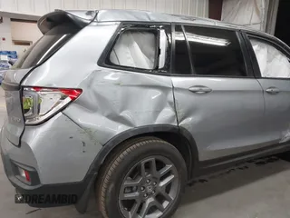 2023 Honda Passport EX-L with VIN 5FNYF8H56PB025612, listed as a IAAI auction lot 41937956 with 31,065 mi miles and . Bid and sale history available at DreamBid. Image 6.