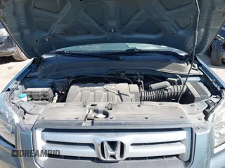 2006 Honda Pilot EX-L with VIN 2HKYF18506H521822, listed as a IAAI auction lot 42012612 with 187,946 mi miles and . Bid and sale history available at DreamBid. Image 10.