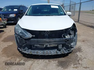 2019 Nissan Sentra S z VIN 3N1AB7AP5KY285776, wystawiony jako IAAI lot #41969976 z przebiegiem 87 187 mil mil oraz . Historia ofert i sprzedaży dostępna na DreamBid. Obrazek 6.