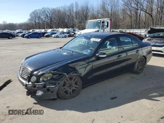 2004 Mercedes-Benz E-Class 3.2L with VIN WDBUF82J14X161148, listed as a Copart auction lot 49736185 with 170,026 mi miles and Salvage Title. Bid and sale history available at carsss.com. Image 1.