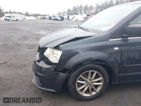 2014 Dodge Grand Caravan SXT with VIN 2C4RDGCG2ER463395, listed as a IAAI auction lot 41709948 with 137,783 mi miles and . Bid and sale history available at DreamBid. Image 12.