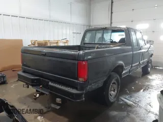1992 Ford F-150 with VIN 1FTEX14N9NKA08784, listed as a IAAI auction lot 40251438 with 1 mi miles. Bid and sale history available at carsss.com. Image 4.