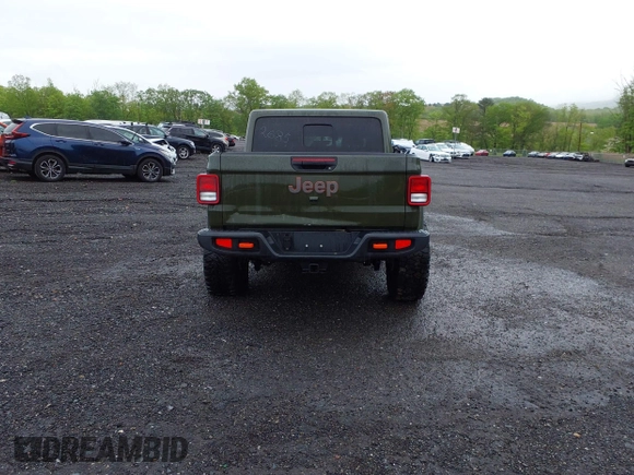 2023 Jeep Gladiator Mojave with VIN 1C6JJTEG6PL564504, listed as a IAAI auction lot 41752685 with 20,430 mi miles and . Bid and sale history available at DreamBid. Image 16.