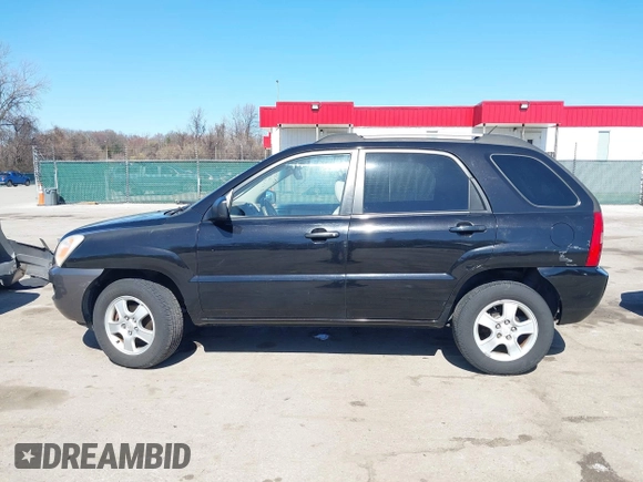 2007 Kia Sportage LX with VIN KNDJF724877313178, listed as a IAAI auction lot 41863492 with 199,138 mi miles. Bid and sale history available at carsss.com. Image 14.