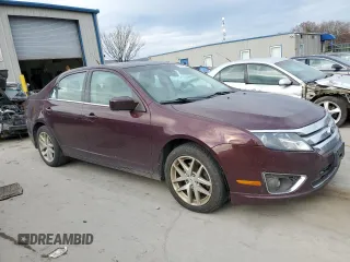 2012 Ford Fusion SEL with VIN 3FAHP0JA8CR424770, listed as a Copart auction lot 44046345 with 218,408 mi miles and Salvage title. Bid and sale history available at DreamBid. Image 4.