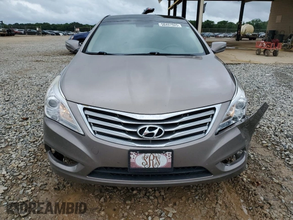 2013 Hyundai Azera z VIN KMHFH4JG4DA262993, wystawiony jako Copart lot #58497925 z przebiegiem 151 568 mil mil oraz Szkoda całkowita • Salvage title. Historia ofert i sprzedaży dostępna na DreamBid. Obrazek 5.