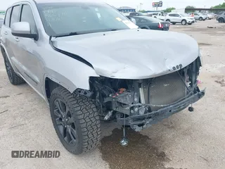 2019 Jeep Grand Cherokee Laredo E with VIN 1C4RJFAG9KC670974, listed as a IAAI auction lot 42333028 with 163,958 mi miles and . Bid and sale history available at DreamBid. Image 6.