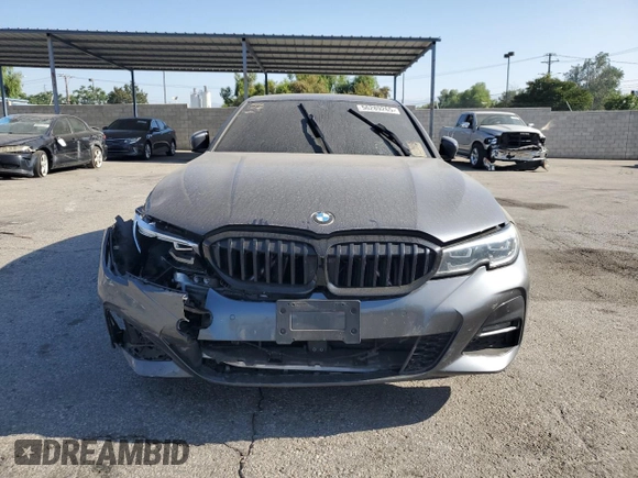 2020 BMW 3 Series 330i z VIN 3MW5R1J00L8B13518, wystawiony jako Copart lot #56289265 z przebiegiem 74 336 mil mil oraz Czysty tytuł • Clean title. Historia ofert i sprzedaży dostępna na DreamBid. Obrazek 5.