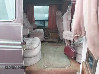 1989 Chevrolet Chevy Van z VIN 1GBEG25K5K7184695, wystawiony jako IAAI lot #42432728 z przebiegiem 945 928 mil mil oraz . Historia ofert i sprzedaży dostępna na DreamBid. Obrazek 8.