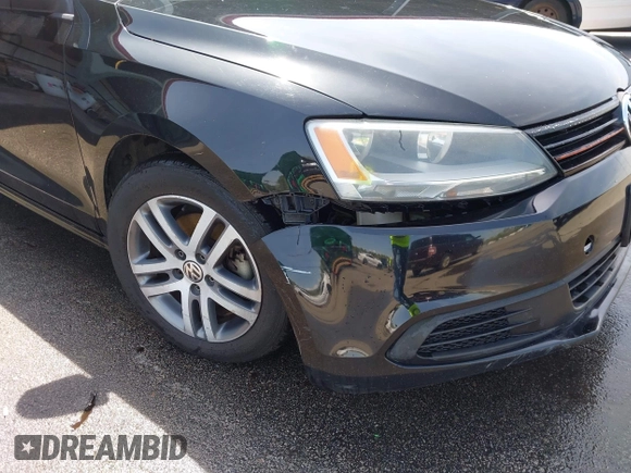 2011 Volkswagen Jetta Sedan SE w/Convenience & Sunroof with VIN 3VWDX7AJ5BM354817, listed as a IAAI auction lot 41919430 with 156,284 mi miles. Bid and sale history available at carsss.com. Image 6.
