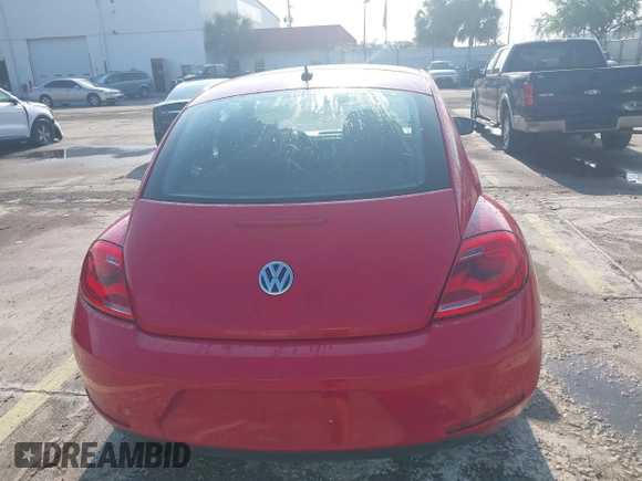 2013 Volkswagen Beetle 2.5L w/Sun/Sound/Nav with VIN 3VWJX7AT4DM672158, listed as a IAAI auction lot 42187543 with 94,961 mi miles and . Bid and sale history available at DreamBid. Image 16.