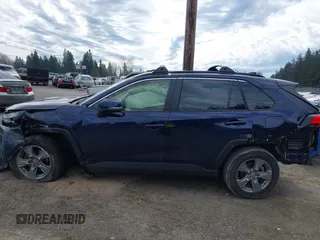 2023 Toyota RAV4 XLE with VIN JTMP1RFV1PD095688, listed as a IAAI auction lot 41874720 with 59,737 mi miles. Bid and sale history available at carsss.com. Image 14.
