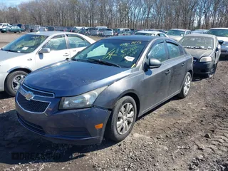 2014 Chevrolet Cruze LS with VIN 1G1PA5SG2E7467480, listed as a IAAI auction lot 41831857 with Not provided miles and . Bid and sale history available at DreamBid. Image 2.