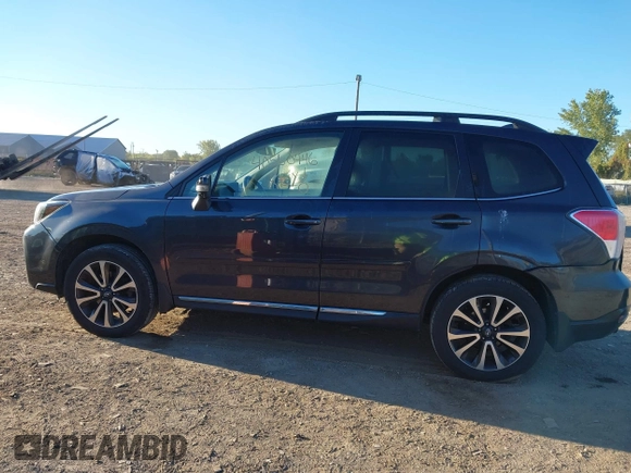 2017 Subaru Forester Touring with VIN JF2SJGTC3HH516646, listed as a IAAI auction lot 40560446 with 85,842 mi miles. Bid and sale history available at carsss.com. Image 14.