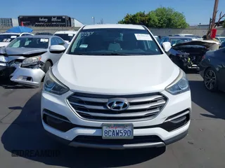 2017 Hyundai Santa Fe 2.4L z VIN 5XYZTDLB0HG403842, wystawiony jako IAAI lot #42206543 z przebiegiem 77 900 mil mil oraz . Historia ofert i sprzedaży dostępna na DreamBid. Obrazek 13.
