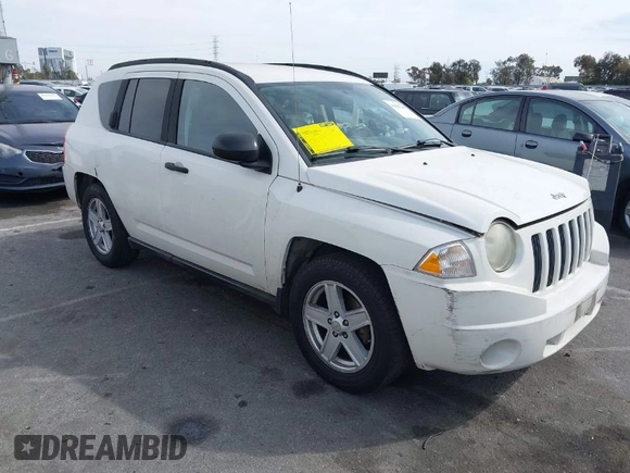2007 Jeep Compass Sport with VIN 1J8FT47W77D145745, listed as a IAAI auction lot 41687495 with 218,231 mi miles. Bid and sale history available at carsss.com. Image 1.