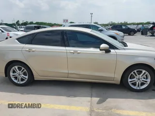 2018 Ford Fusion SE z VIN 3FA6P0H75JR176394, wystawiony jako IAAI lot #42169780 z przebiegiem 65 617 mil mil oraz . Historia ofert i sprzedaży dostępna na DreamBid. Obrazek 13.