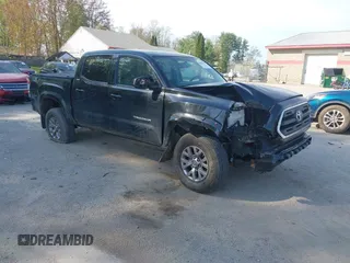 2016 Toyota Tacoma SR z VIN 3TMCZ5AN9GM012309, wystawiony jako IAAI lot #42259033 z przebiegiem 71 352 mil mil oraz . Historia ofert i sprzedaży dostępna na DreamBid. Obrazek 1.