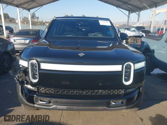 2024 Rivian R1S Adventure with VIN 7PDSGABAXRN034598, listed as a IAAI auction lot 41312180 with 23,615 mi miles. Bid and sale history available at carsss.com. Image 13.
