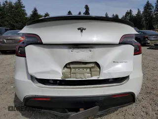2020 Tesla Model Y Long Range with VIN 5YJYGDEF2LF006357, listed as a Copart auction lot 54888215 with 55,983 mi miles and Salvage Title. Bid and sale history available at DreamBid. Image 6.
