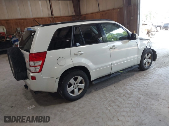 2009 Suzuki Grand Vitara z VIN JS3TD044294100168, wystawiony jako IAAI lot #42489252 z przebiegiem 152 679 mil mil oraz . Historia ofert i sprzedaży dostępna na DreamBid. Obrazek 4.