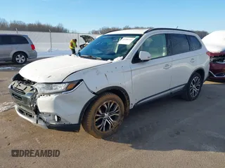 2016 Mitsubishi Outlander SE with VIN JA4AD3A32GZ001878, listed as a IAAI auction lot 41286349 with 153,225 mi miles and . Bid and sale history available at DreamBid. Image 2.