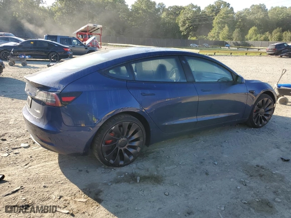 2023 Tesla Model 3 Performance with VIN 5YJ3E1EC2PF669938, listed as a Copart auction lot 70223194 with 0 mi miles and Salvage Title. Bid and sale history available at carsss.com. Image 3.