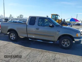 2002 Ford F-150 XL with VIN 1FTRX17232NA79508, listed as a IAAI auction lot 41870844 with 111,429 mi miles. Bid and sale history available at carsss.com. Image 13.