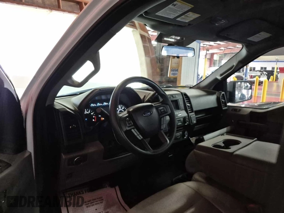 2018 Ford F-150 XL with VIN 1FTMF1EB6JKF86421, listed as a IAAI auction lot 42679350 with 11,869 mi miles and . Bid and sale history available at DreamBid. Image 1.