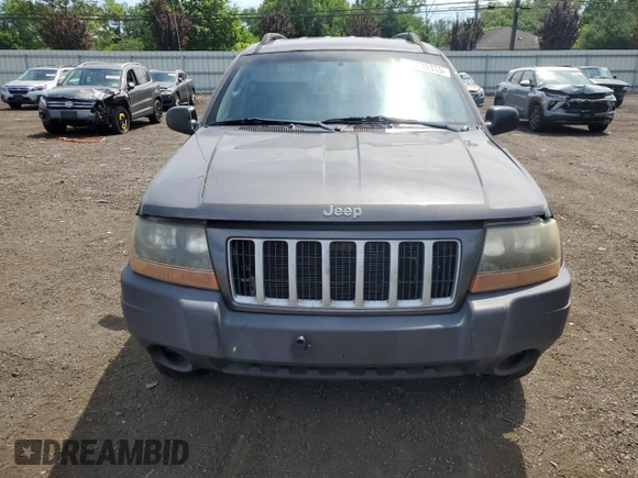2004 Jeep Grand Cherokee Laredo with VIN 1J4GW48S64C291404, listed as a Copart auction lot 62835335 with 170,365 mi miles and Salvage title. Bid and sale history available at DreamBid. Image 5.