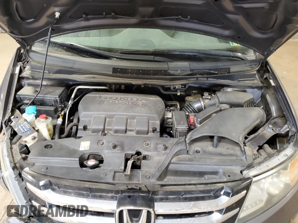 2015 Honda Odyssey LX with VIN 5FNRL5H20FB030966, listed as a Copart auction lot 55086665 with 123,100 mi miles and Salvage Title. Bid and sale history available at DreamBid. Image 12.