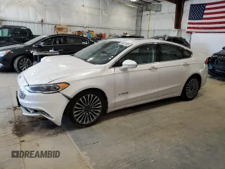 2017 Ford Fusion Hybrid Titanium with VIN 3FA6P0RU9HR394059, listed as a Copart auction lot 56661505 with 178,468 mi miles and Non repairable. Bid and sale history available at DreamBid. Image 1.