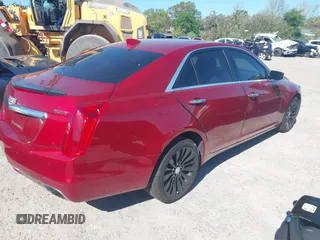 2016 Cadillac CTS Luxury Collection AWD with VIN 1G6AX5SXXG0100952, listed as a IAAI auction lot 41736200 with 123,495 mi miles and . Bid and sale history available at DreamBid. Image 4.