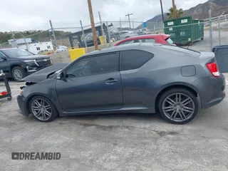 2013 Scion tC with VIN JTKJF5C74D3052964, listed as a IAAI auction lot 41804627 with 244,013 mi miles. Bid and sale history available at carsss.com. Image 14.