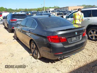2013 BMW 5 Series 528i with VIN WBAXG5C5XDD233300, listed as a IAAI auction lot 41996457 with 91,899 mi miles and . Bid and sale history available at carsss.com. Image 3.
