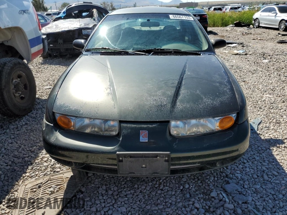 2000 Saturn SL with VIN 1G8ZH5285YZ240565, listed as a Copart auction lot 66567153 with 202,109 mi miles and Salvage title. Bid and sale history available at DreamBid. Image 5.