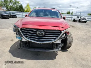 2017 Mazda CX-9 Grand Touring z VIN JM3TCBDY3H0132057, wystawiony jako Copart lot #57400185 z przebiegiem 108 122 mil mil oraz Szkody całkowita. Historia ofert i sprzedaży dostępna na DreamBid. Obrazek 5.