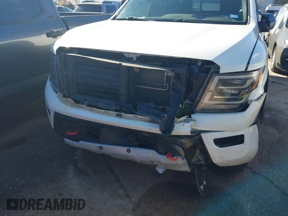 2021 Nissan Titan Pro-4X with VIN 1N6AA1ED5MN533759, listed as a IAAI auction lot 41203812 with 39,154 mi miles and . Bid and sale history available at DreamBid. Image 6.