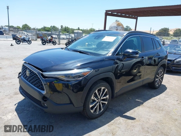 2022 Toyota Corolla Cross XLE with VIN 7MUEAABG3NV042742, listed as a IAAI auction lot 42595052 with 54,299 mi miles and . Bid and sale history available at DreamBid. Image 2.