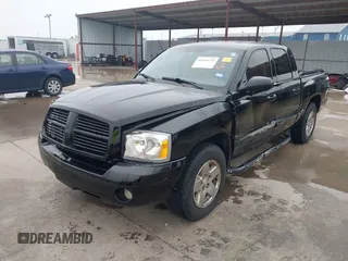 2005 Dodge Dakota SLT z VIN 1D7HE48N05S304121, wystawiony jako IAAI lot #42165773 z przebiegiem 192 886 mil mil oraz . Historia ofert i sprzedaży dostępna na DreamBid. Obrazek 17.